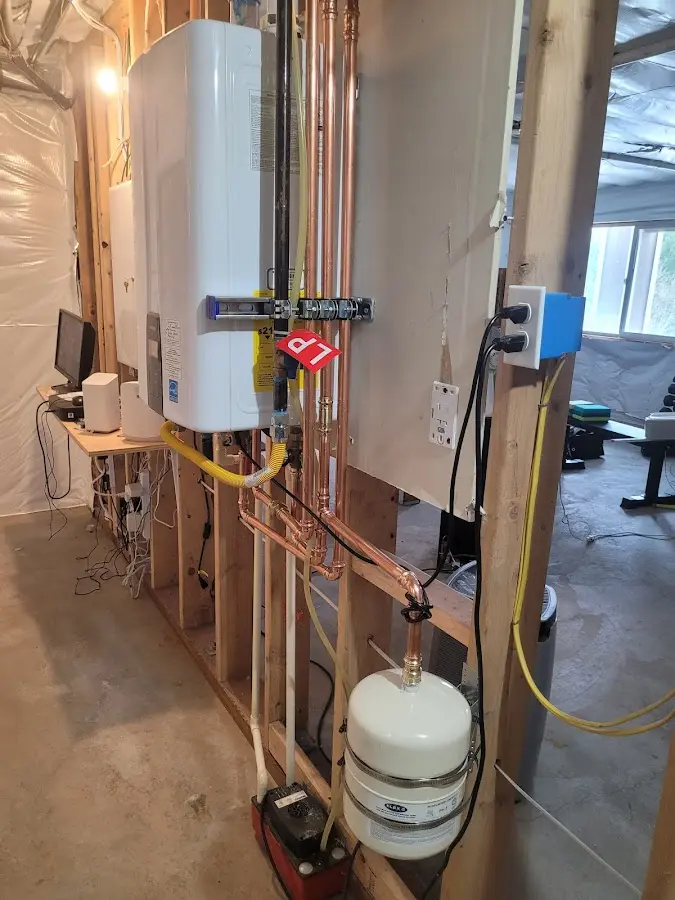Licensed plumber repairing a kitchen sink in Bergen
